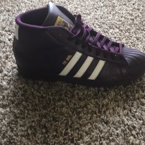 Pro model hit top adidas shell toes